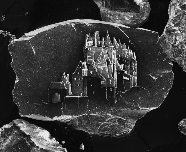 World's smallest sandcastle... etched on a single grain of sand.